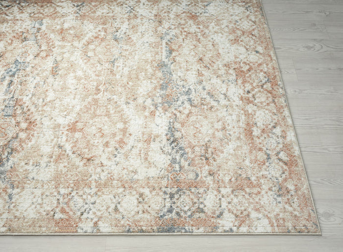 Aria Traditional Faded Cream Rug